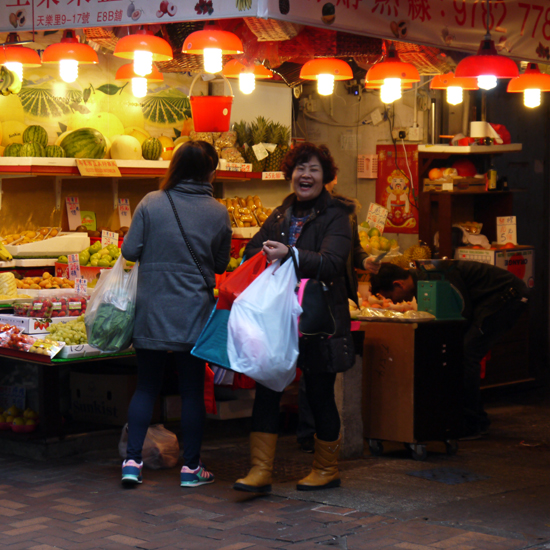Hong Kong, Wan Chai, Laughing woman at market, mar. 2014 Hong Kong, Wan Chai, Laughing woman at market